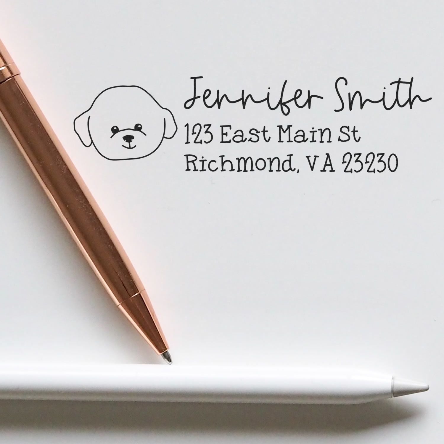 Custom dog address rubber stamp for Jennifer Smith, 123 East Main St, Richmond, VA 23230.