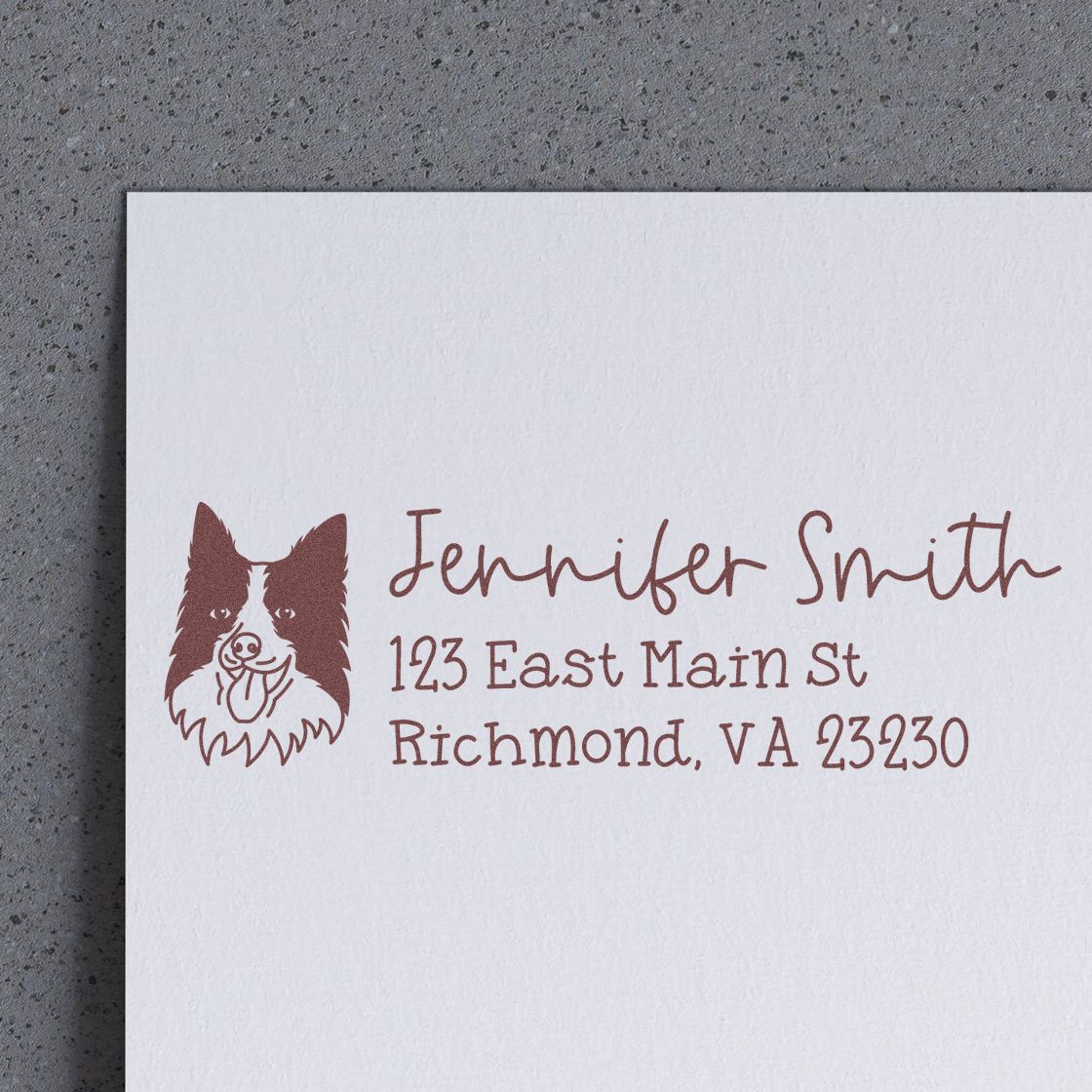 Custom rubber return address stamp with dog logo, Jennifer Smith name, and Richmond, VA address for personalized mailing.
