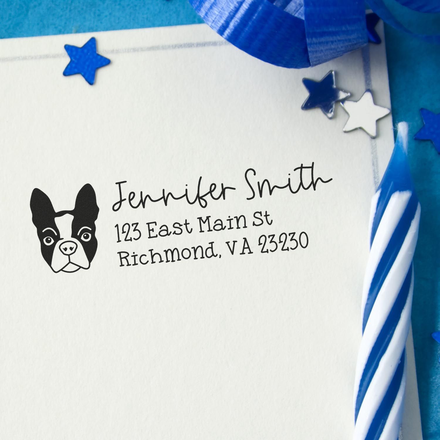 Custom rubber stamp return address with dog logo on envelope, featuring name and address for pet-themed mail.