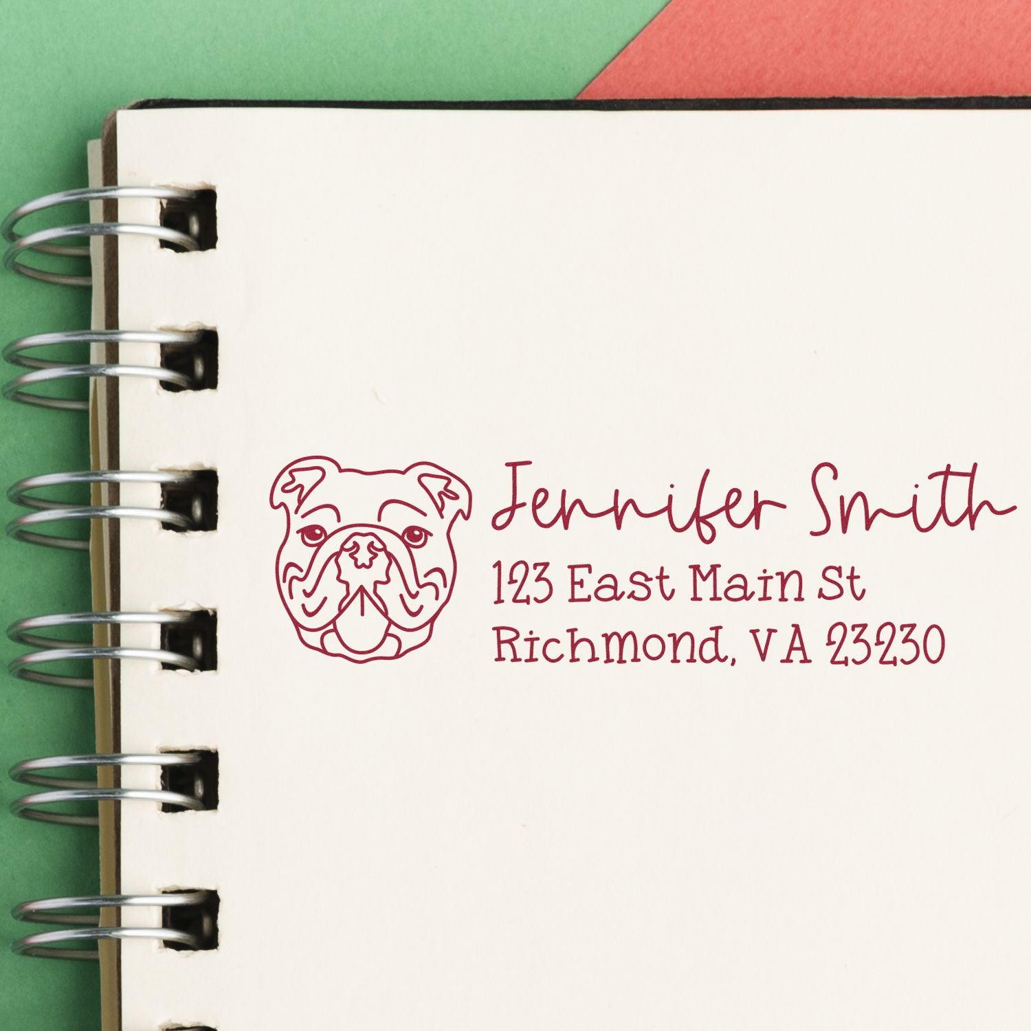 Custom bulldog return address rubber stamp with name and Richmond, VA address on a notebook page.