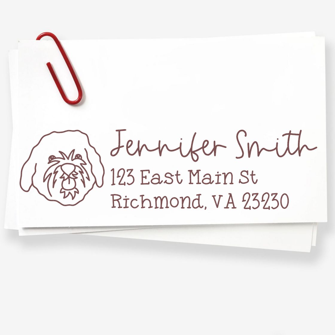 Custom return address rubber stamp with dog illustration for Jennifer Smith, Richmond, VA 23230.