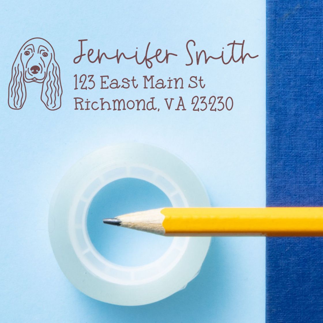 Custom rubber return address stamp with dog illustration and Jennifer Smith, Richmond, VA mailing details.