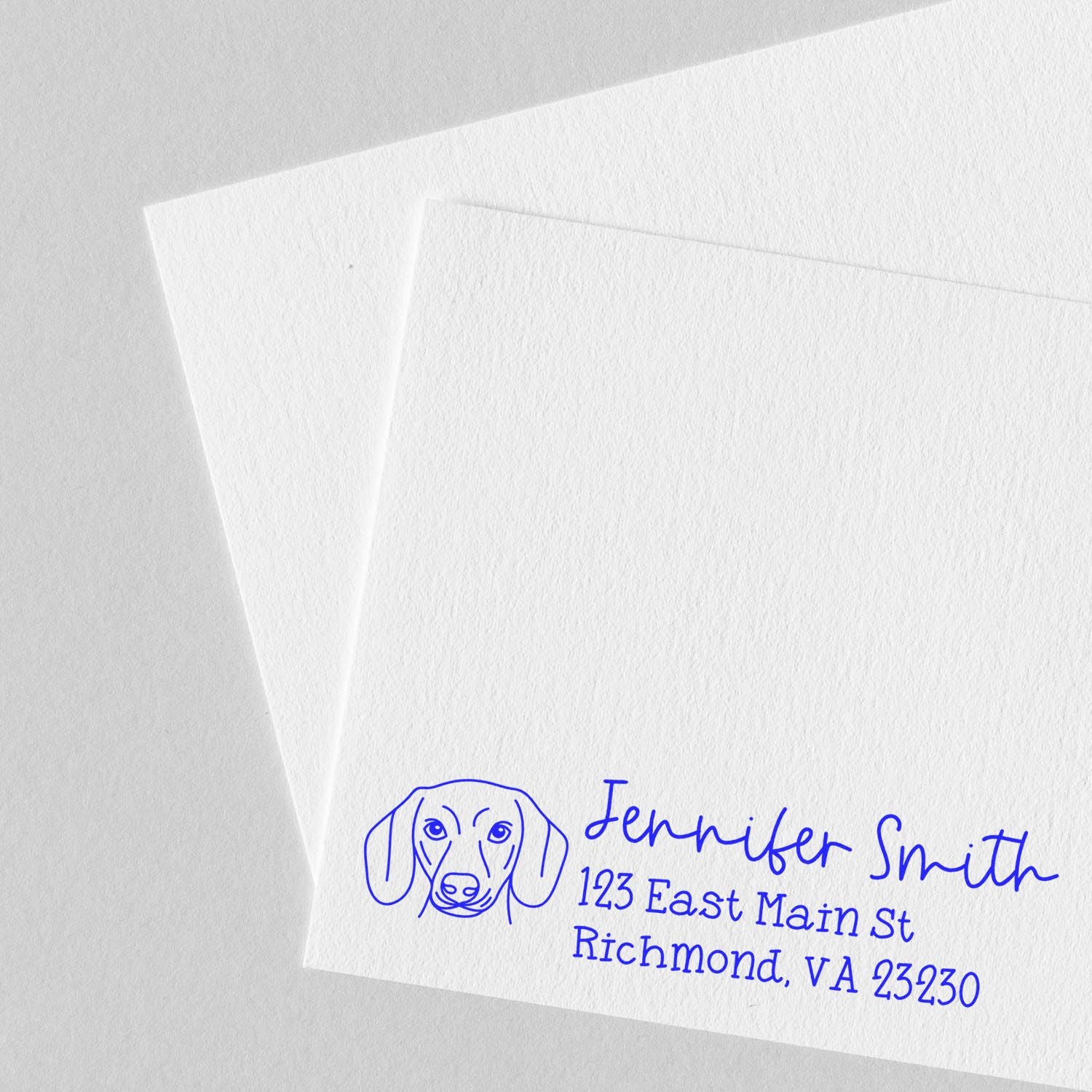 Custom return address rubber stamp with dog logo for Jennifer Smith, 123 East Main St, Richmond, VA 23230