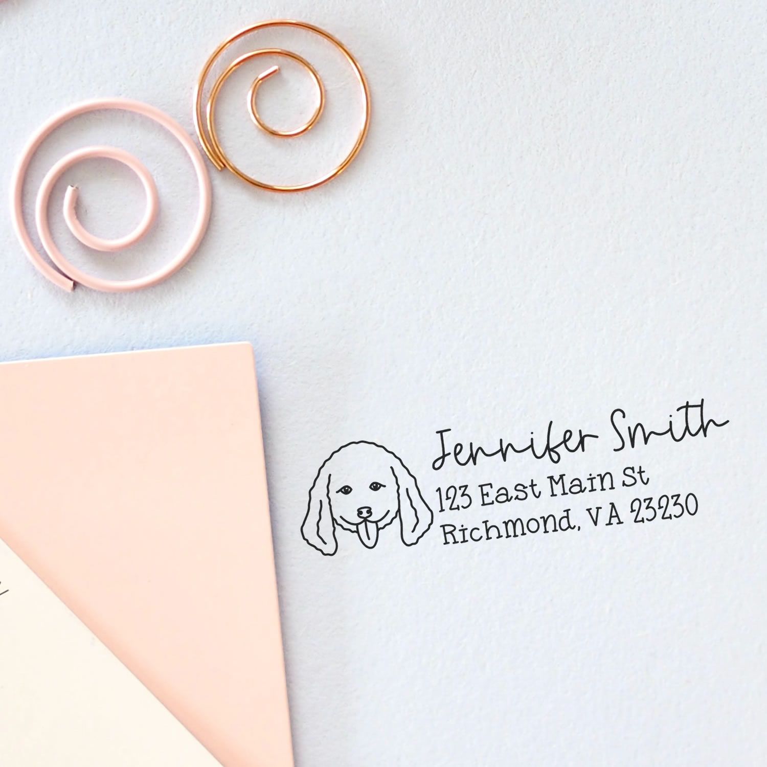 Custom dog return address rubber stamp on stationery, ideal for personalized envelope and mail labeling.
