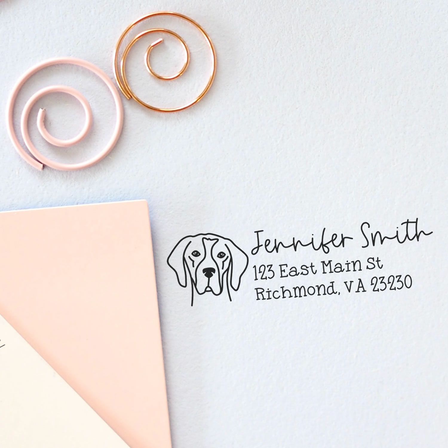 Custom dog return address rubber stamp on stationery with name and address, ideal for personalized envelopes.