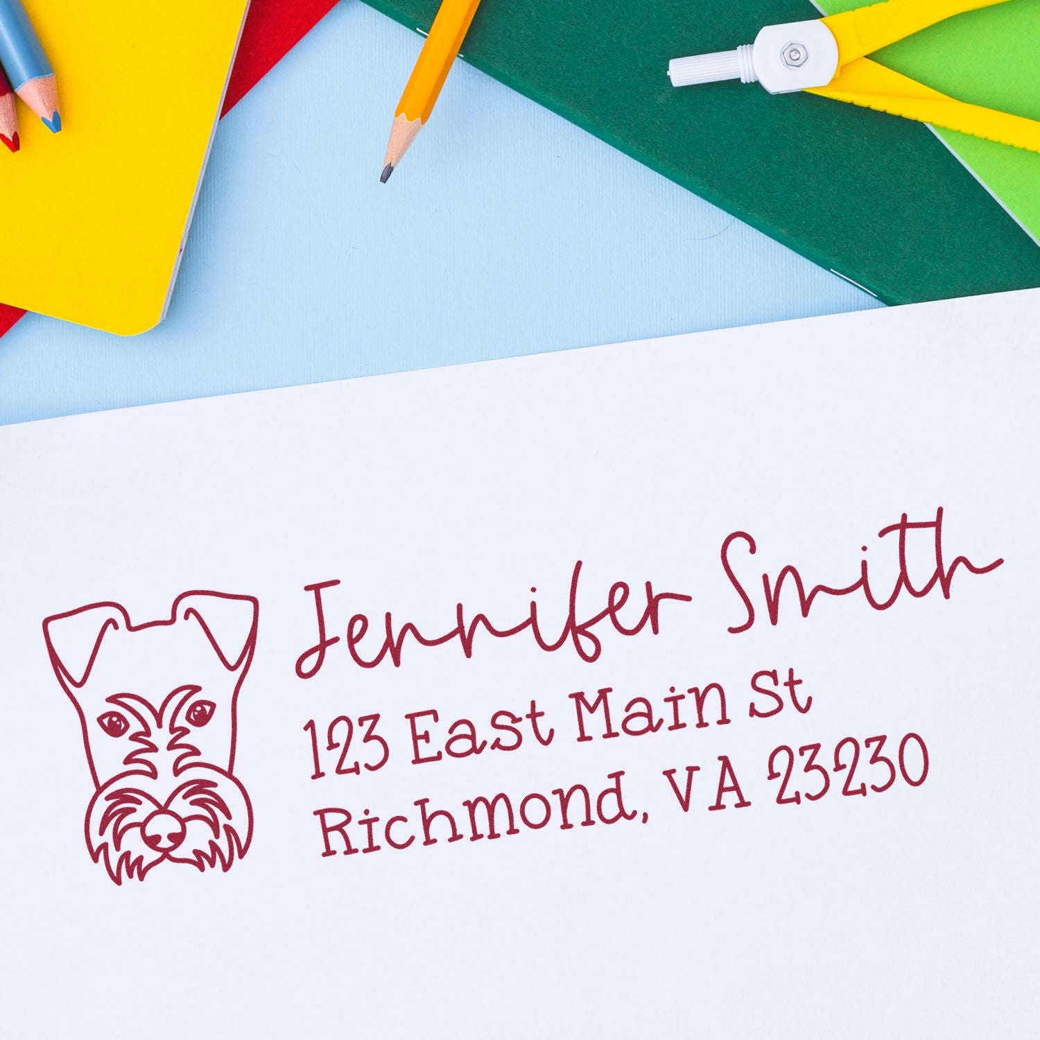 Custom return address rubber stamp for Jennifer Smith with dog logo, Richmond, VA address on stationery.