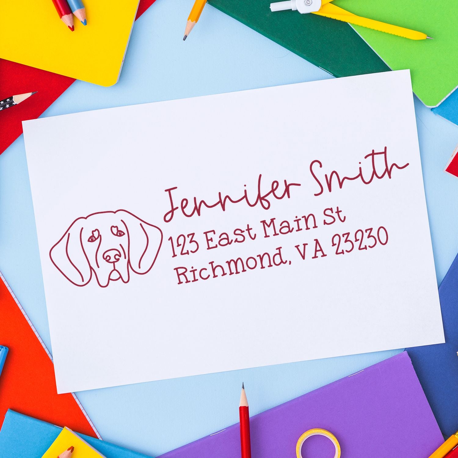 Personalized rubber address stamp with dog logo and return address for Jennifer Smith, Richmond, VA.