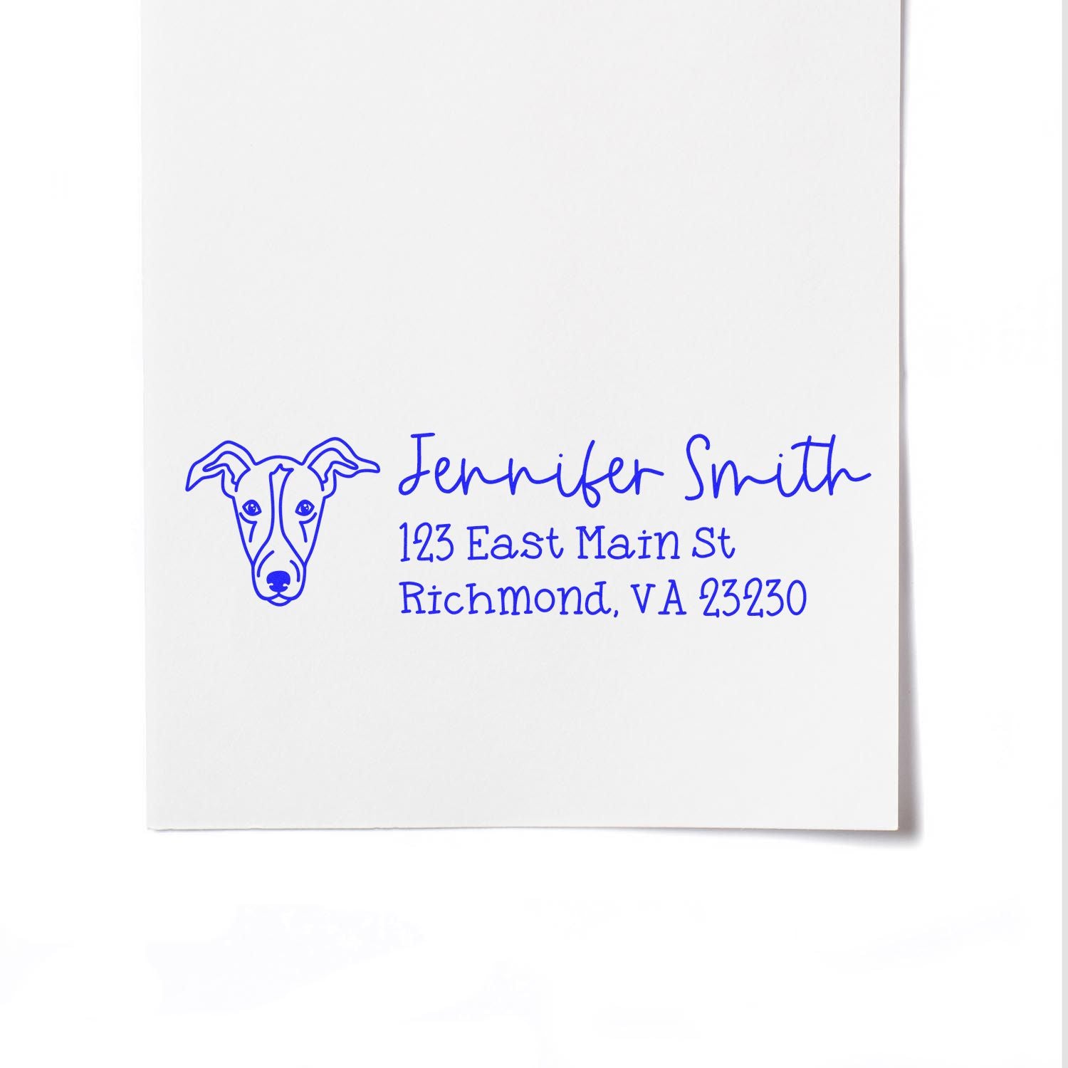 Custom dog return address rubber stamp with name and address for personalized envelopes and stationery.
