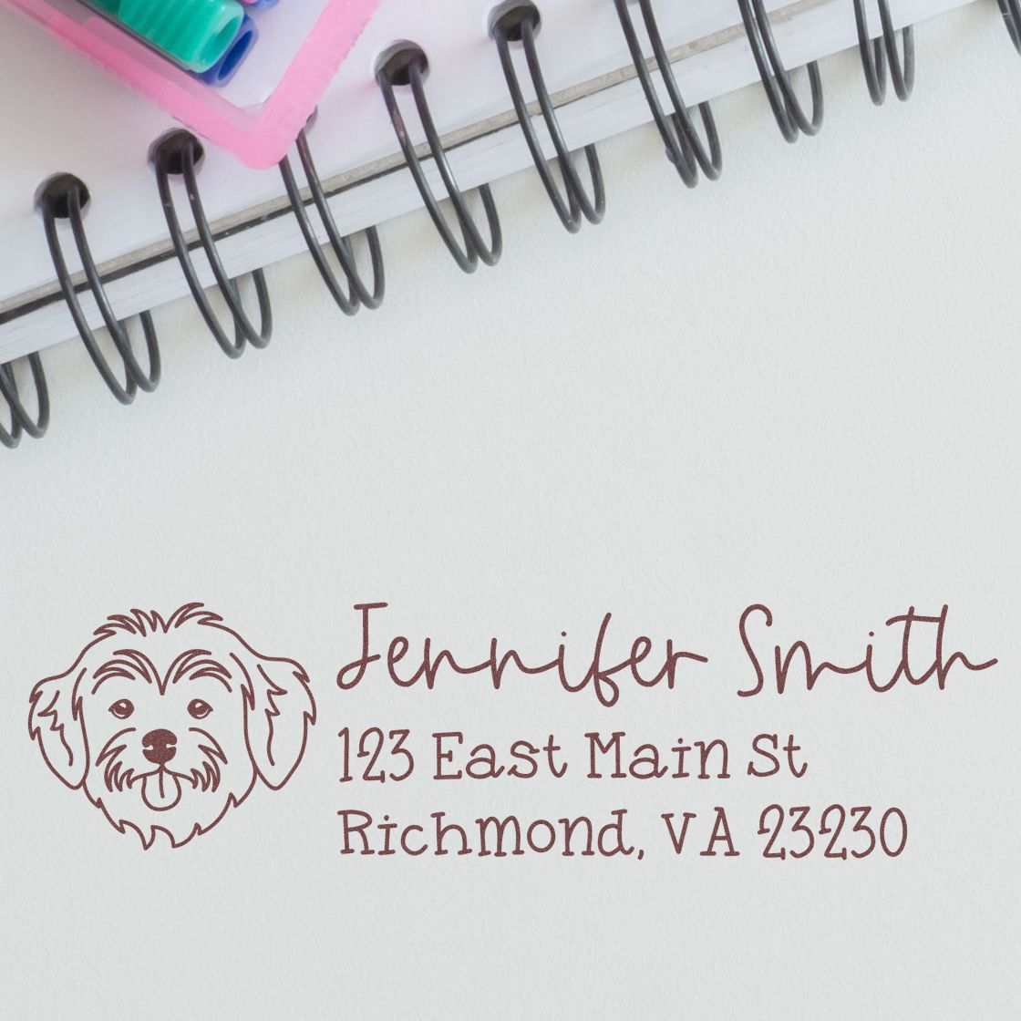 Personalized address rubber stamp with dog icon for Jennifer Smith, Richmond, VA return address.