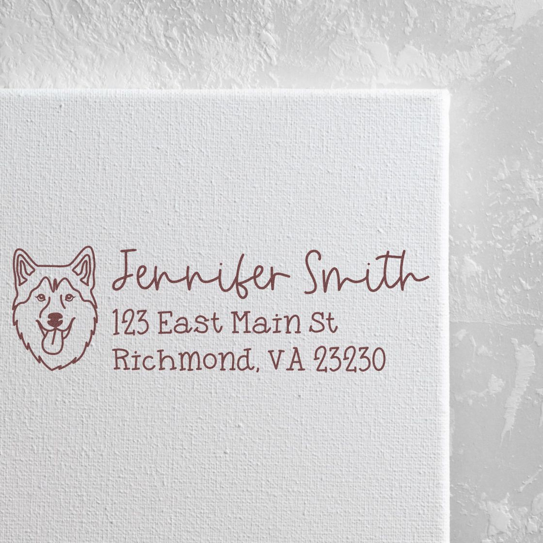Custom address rubber stamp with husky logo for Jennifer Smith, 123 East Main St, Richmond, VA 23230.