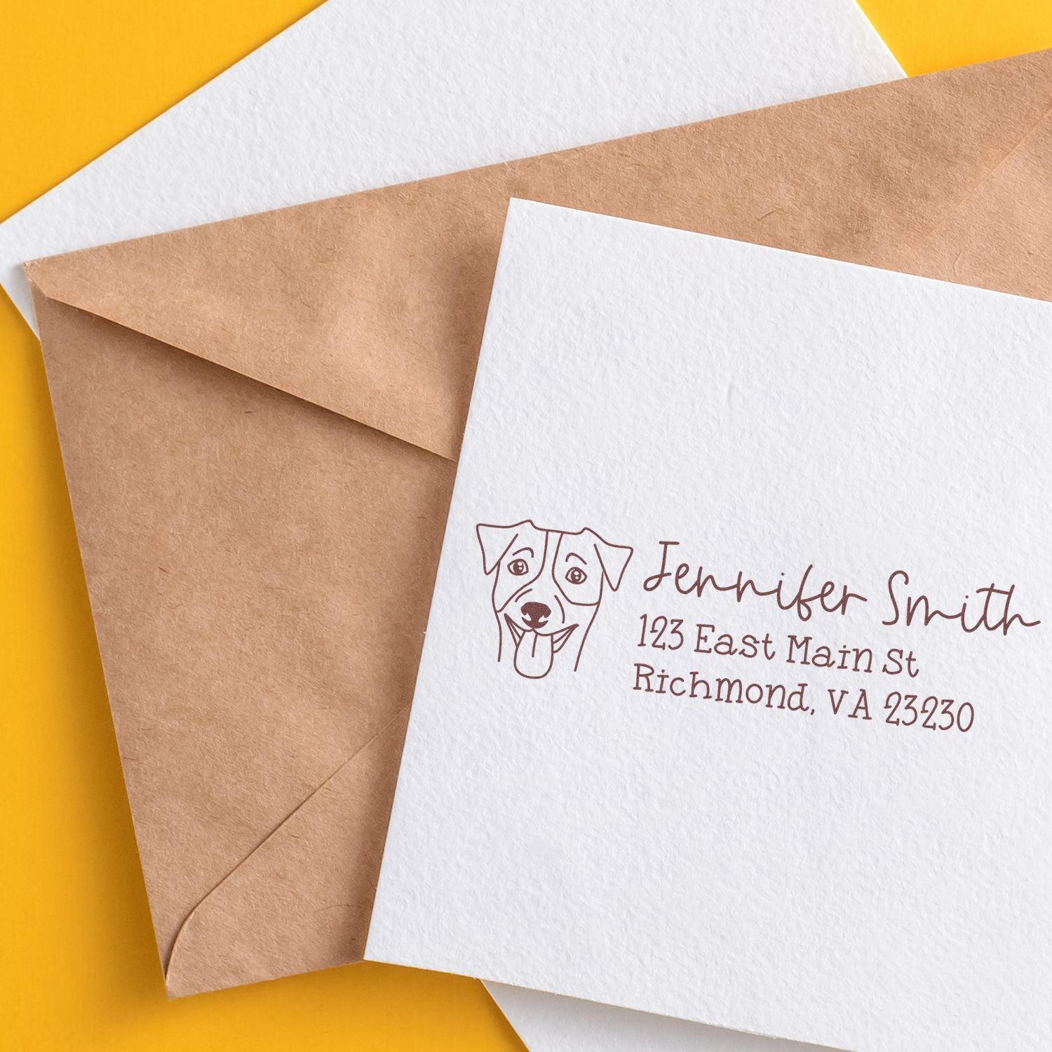 Custom dog return address rubber stamp on envelope with name and address for personalized mailing and branding.