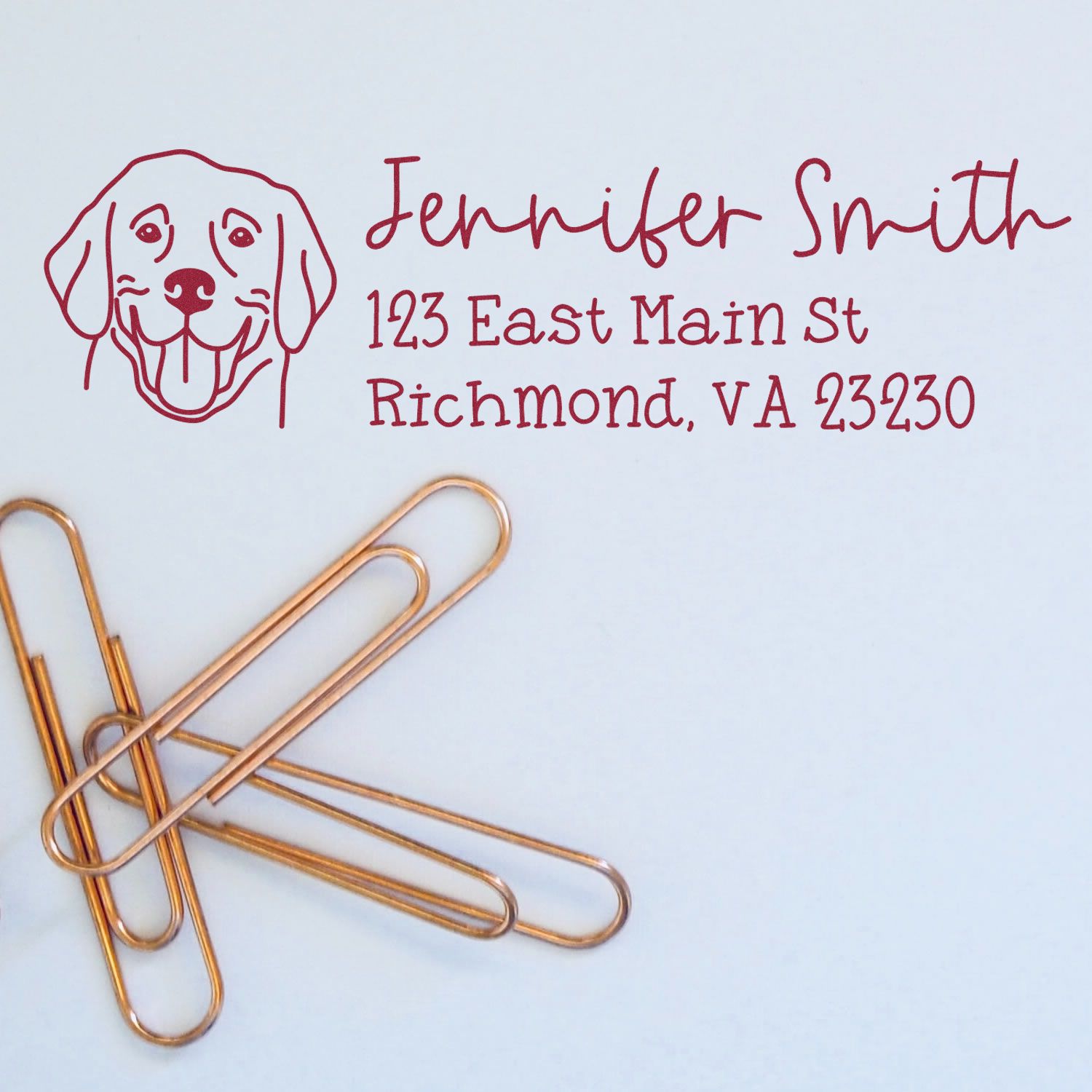 Personalized dog return address rubber stamp for Jennifer Smith, 123 East Main St, Richmond, VA 23230.