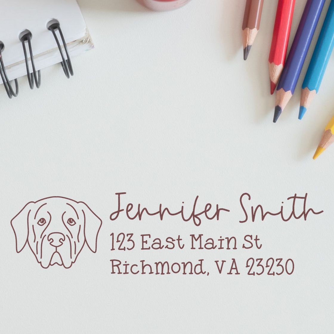 Custom dog address rubber stamp with name and return address, featuring a Labrador illustration for personalized mailing.