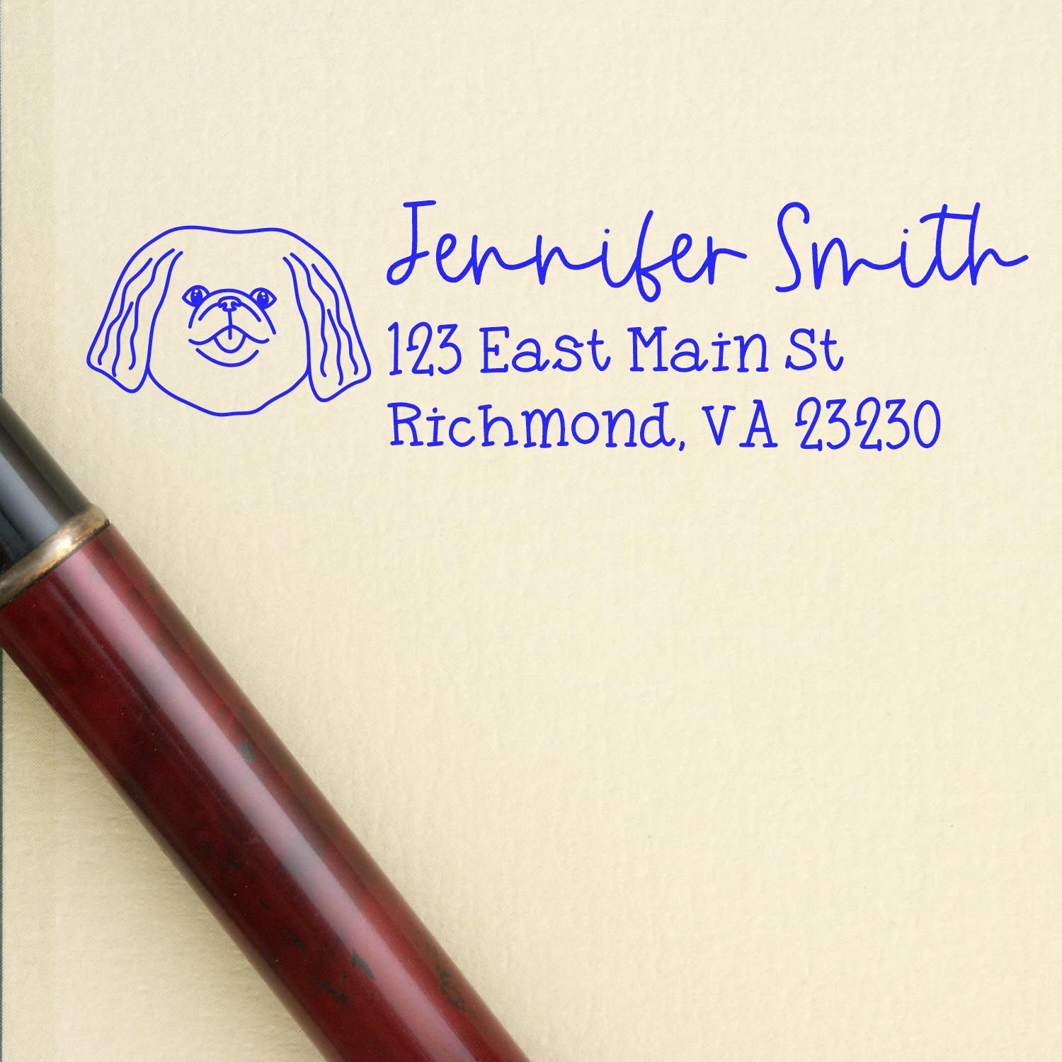 Personalized dog address rubber stamp for Jennifer Smith, Richmond, VA return address in blue ink.
