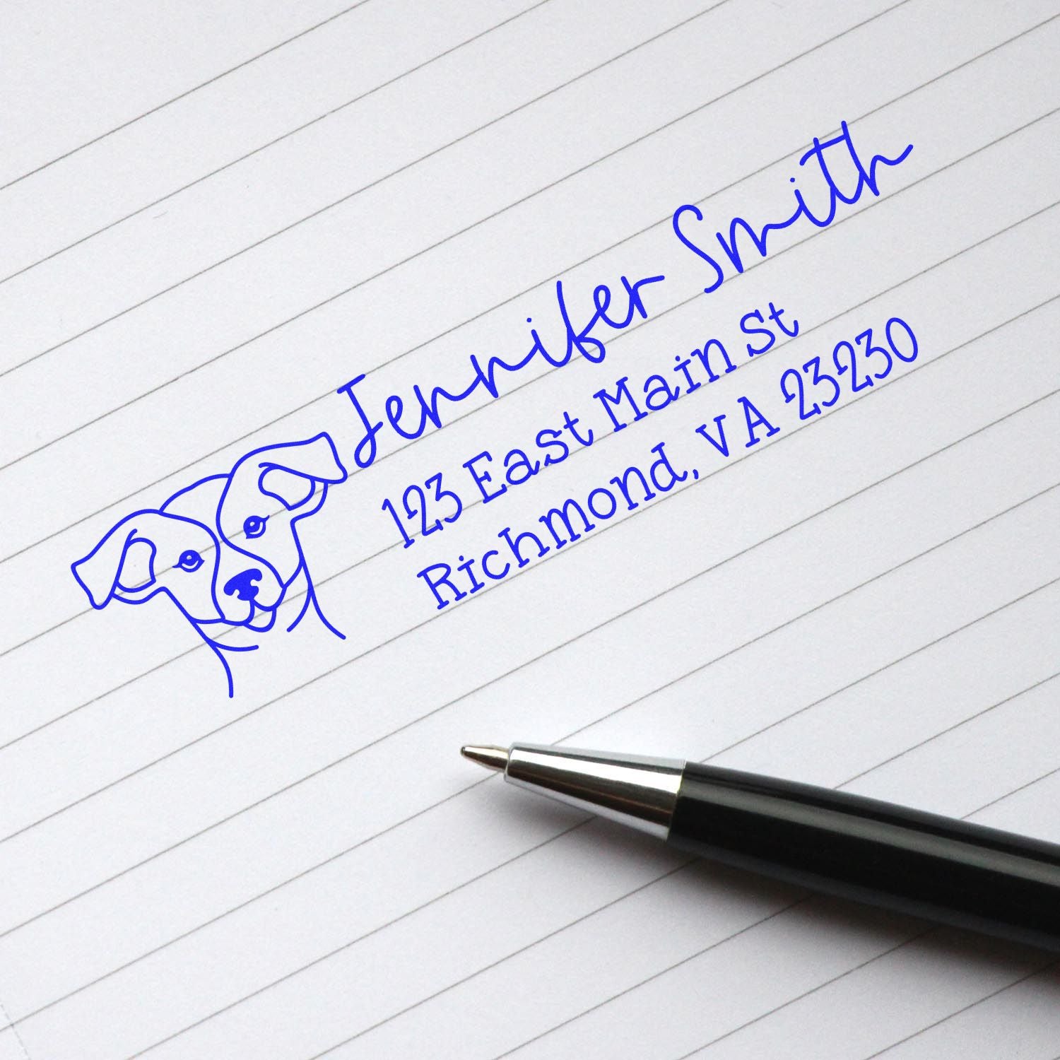 Custom return address rubber stamp with dog logo, blue ink impression for Jennifer Smith.
