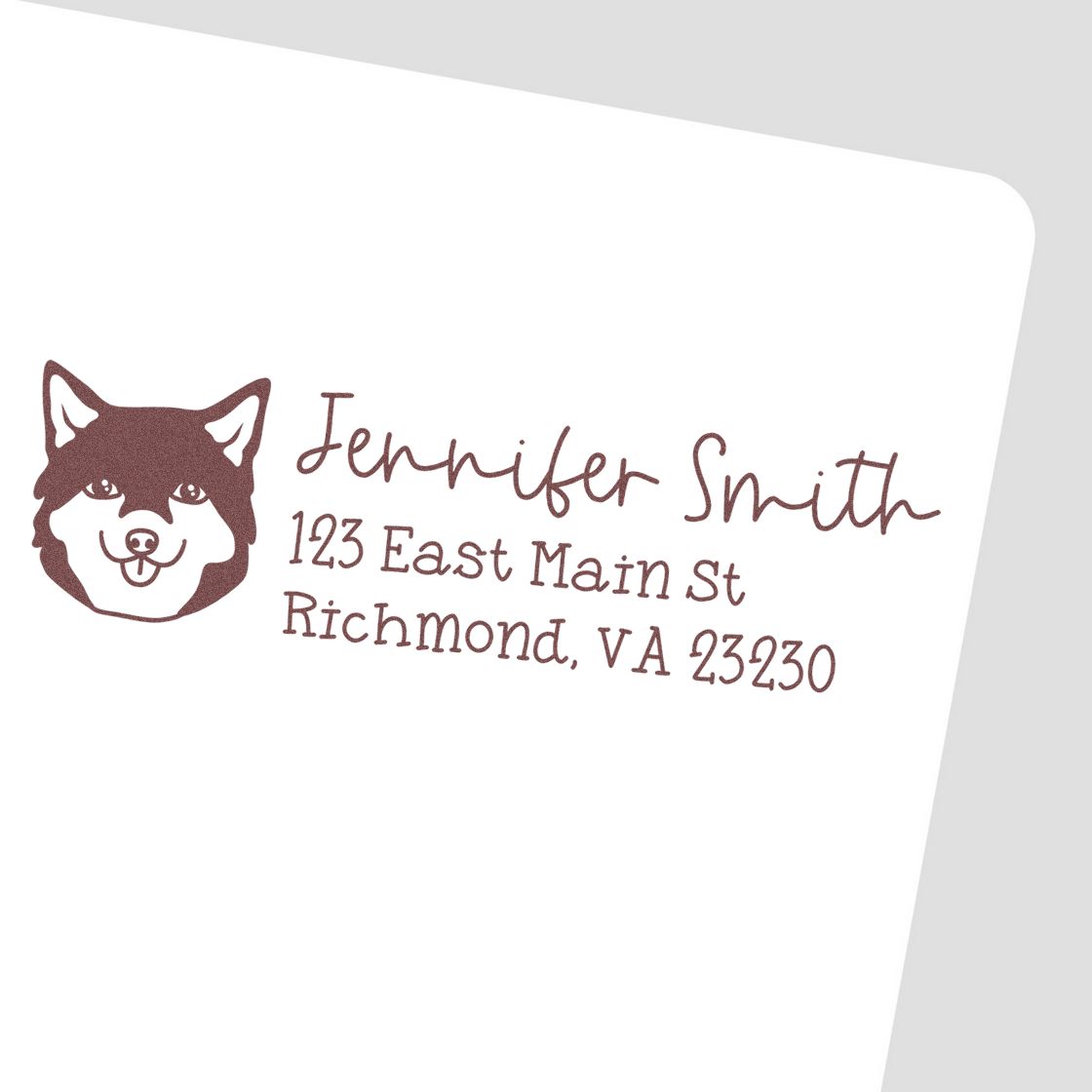 Custom return address rubber stamp with husky dog icon for Jennifer Smith, 123 East Main St, Richmond, VA 23230