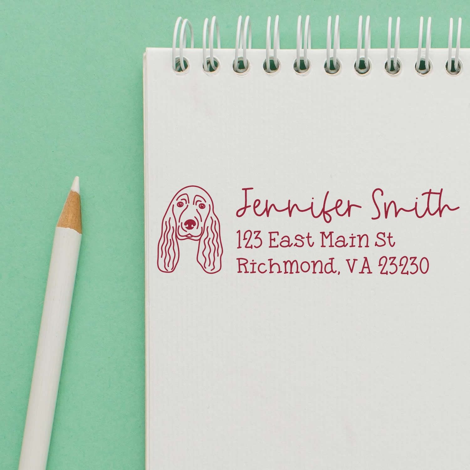 Personalized dog return address rubber stamp for Jennifer Smith, 123 East Main St, Richmond, VA 23230.