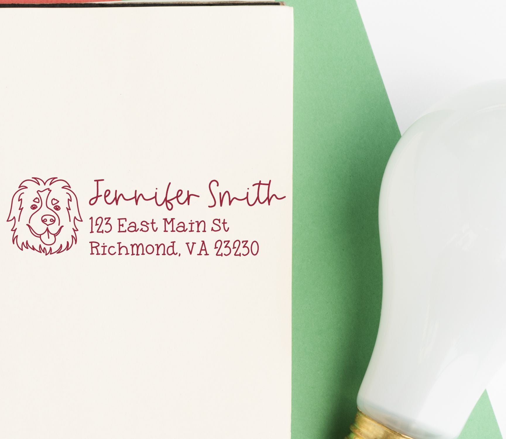 Personalized dog address rubber stamp with name and Richmond, VA return address on paper