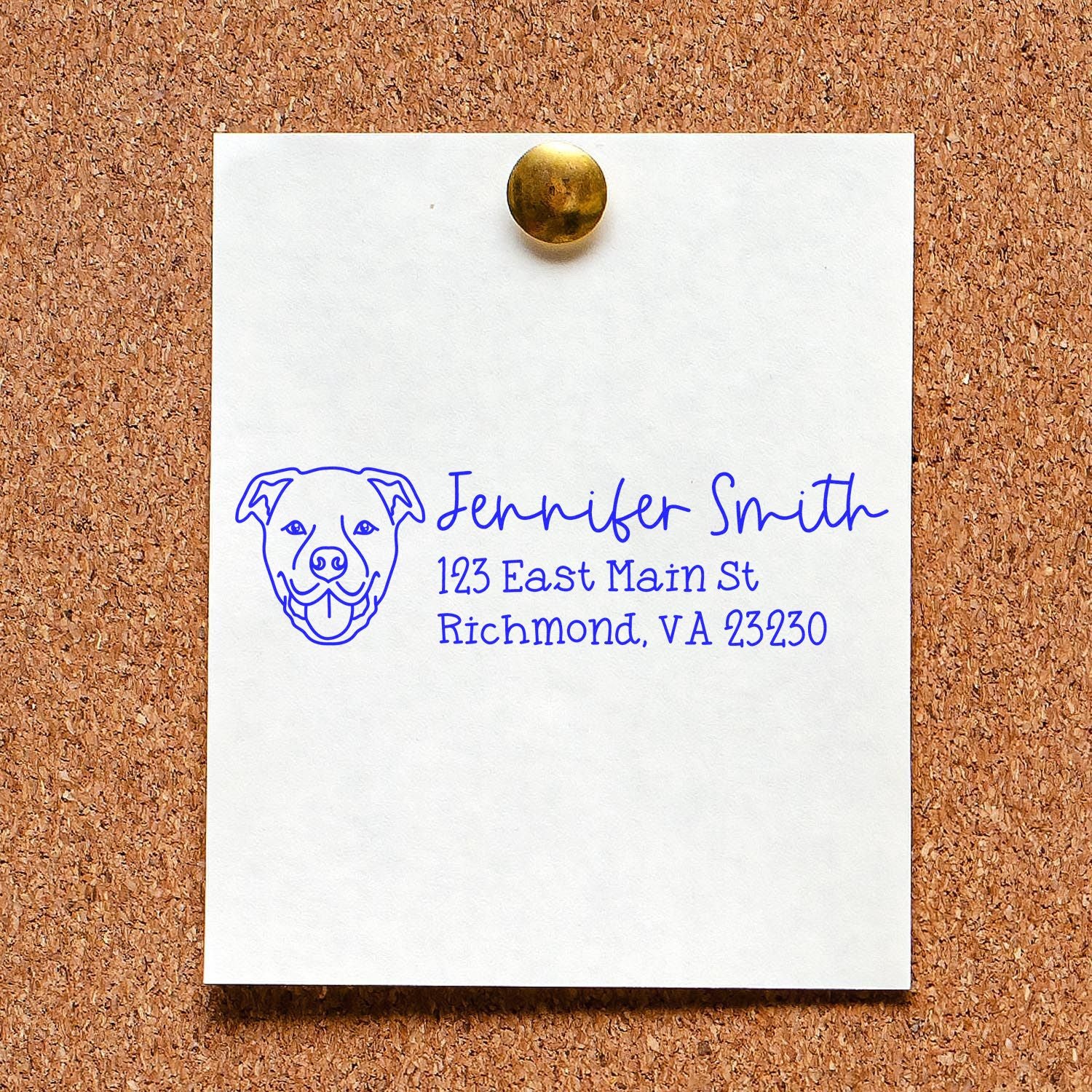 Personalized dog return address rubber stamp with name and Richmond, VA address on corkboard.