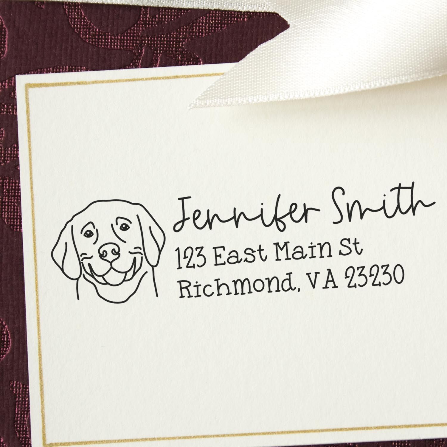 Personalized dog return address rubber stamp for Jennifer Smith, 123 East Main St, Richmond, VA 23230.