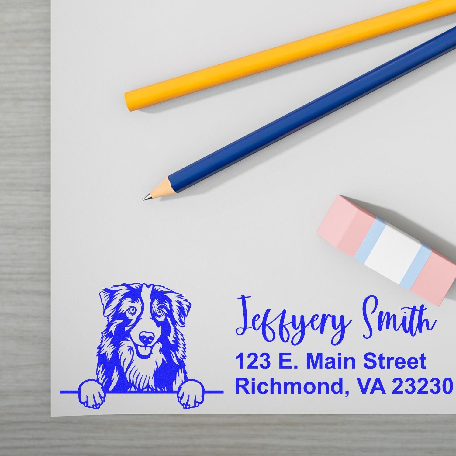 Custom rubber address stamp with dog logo for Jeffrey Smith, featuring 123 E. Main Street, Richmond, VA 23230.