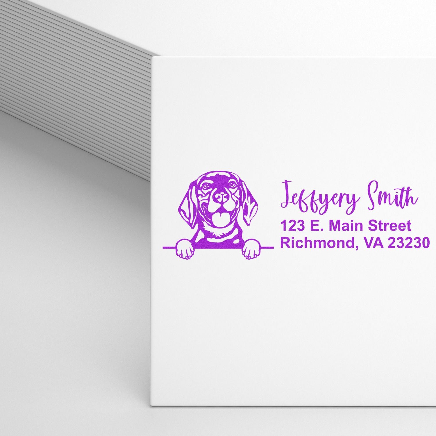 Custom return address rubber stamp with dog illustration, featuring personalized name and Richmond, VA address in purple.