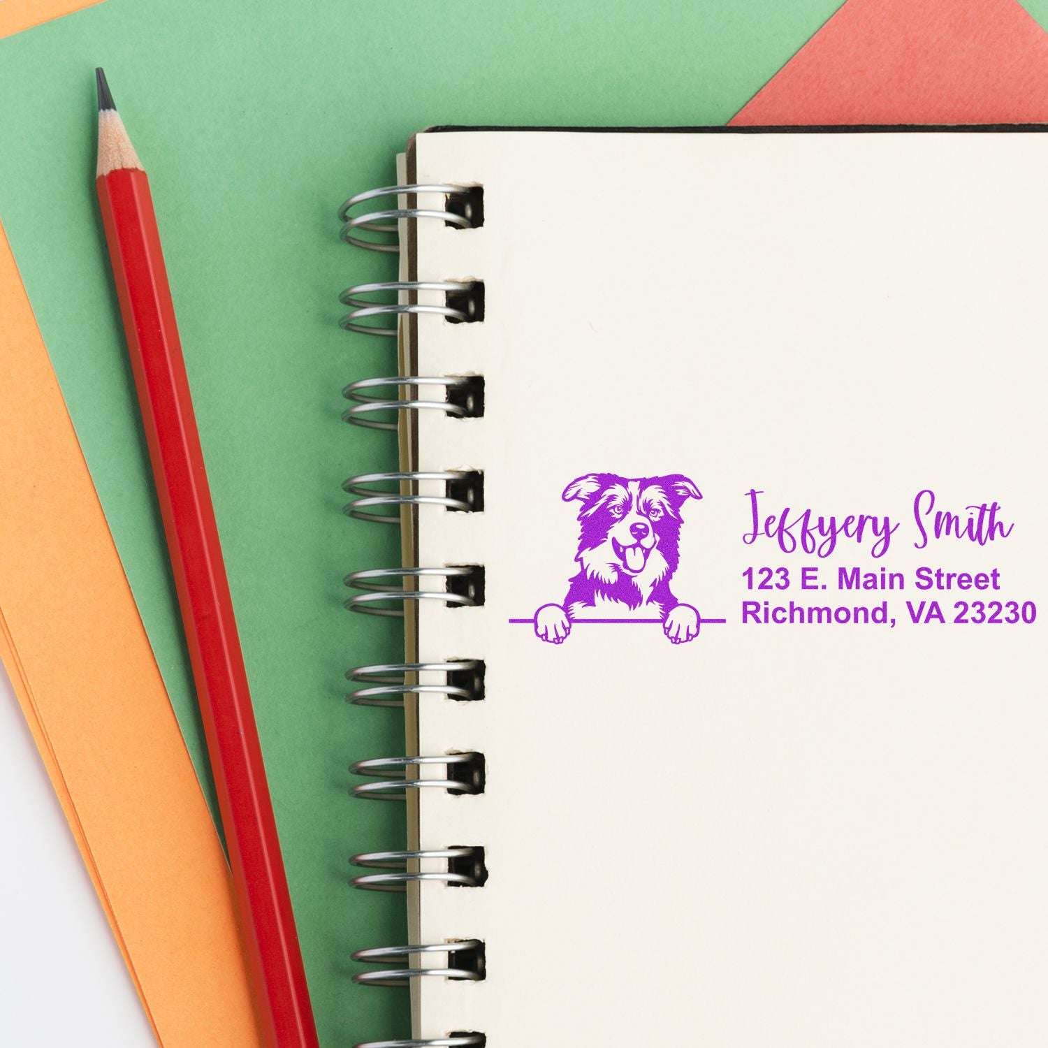 Custom dog return address rubber stamp impression with name and Richmond, VA address on notebook paper.