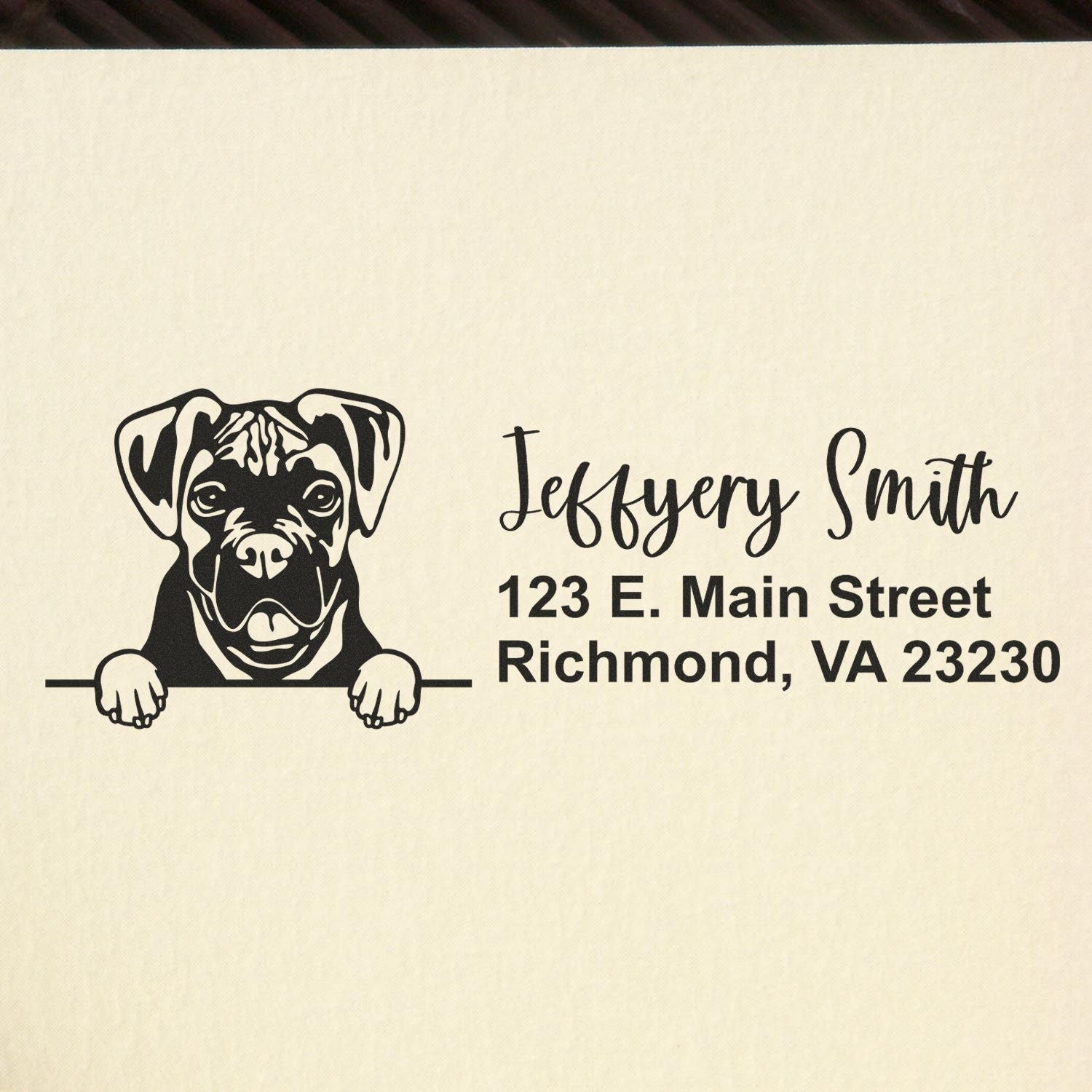 Custom rubber address stamp with dog illustration and return address for Jeffrey Smith, 123 E. Main Street, Richmond, VA 23230
