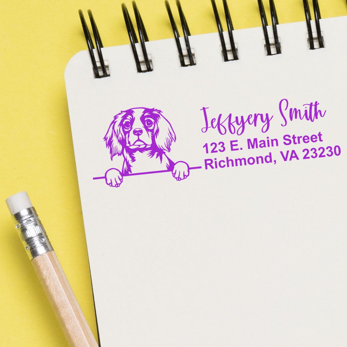 Custom rubber return address stamp with dog illustration and personalized name and address for pet lovers.