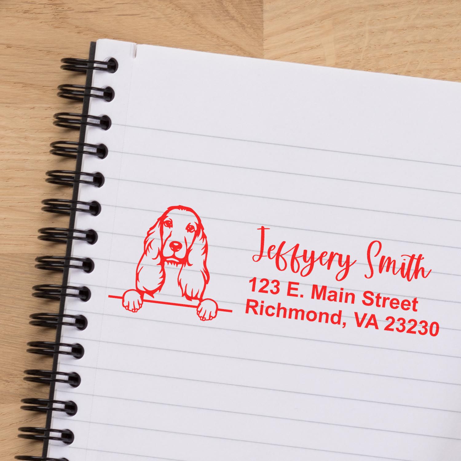 Personalized dog address stamp impression on notebook paper, featuring name and Richmond, VA address.
