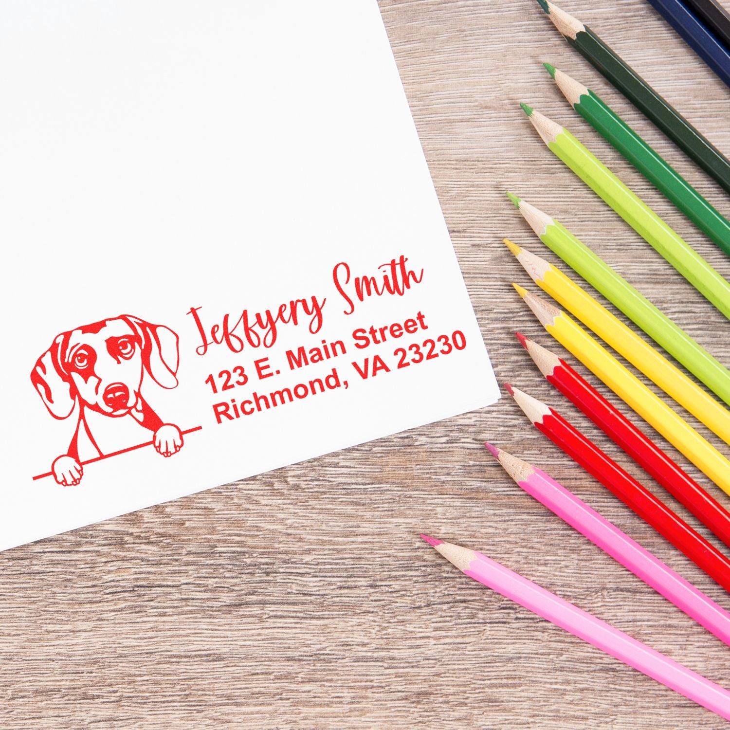 Custom dog return address rubber stamp for personalized mailing, shown with name, street address, and colorful pencils.