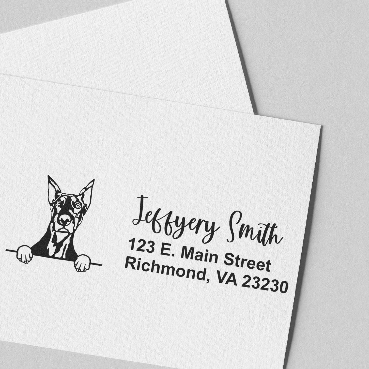 Custom rubber stamp return address on envelope with dog illustration, Jeffery Smith, and Richmond, VA address.