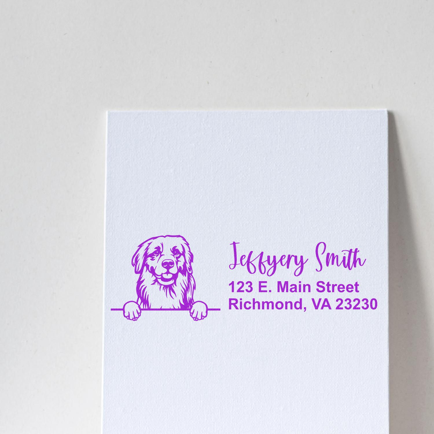 Custom return address rubber stamp with dog logo, Jeffrey Smith name, and Richmond, VA 23230 in purple.
