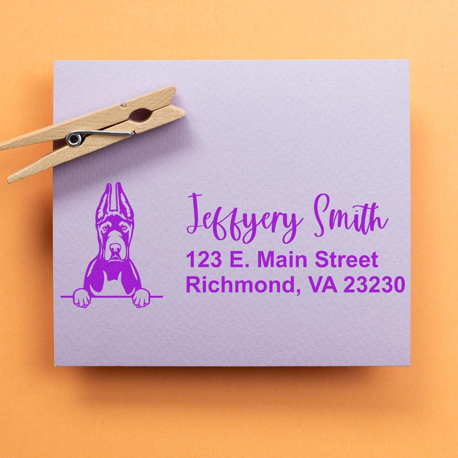 Custom dog address rubber stamp with personalized return address for mailing labels and stationery.