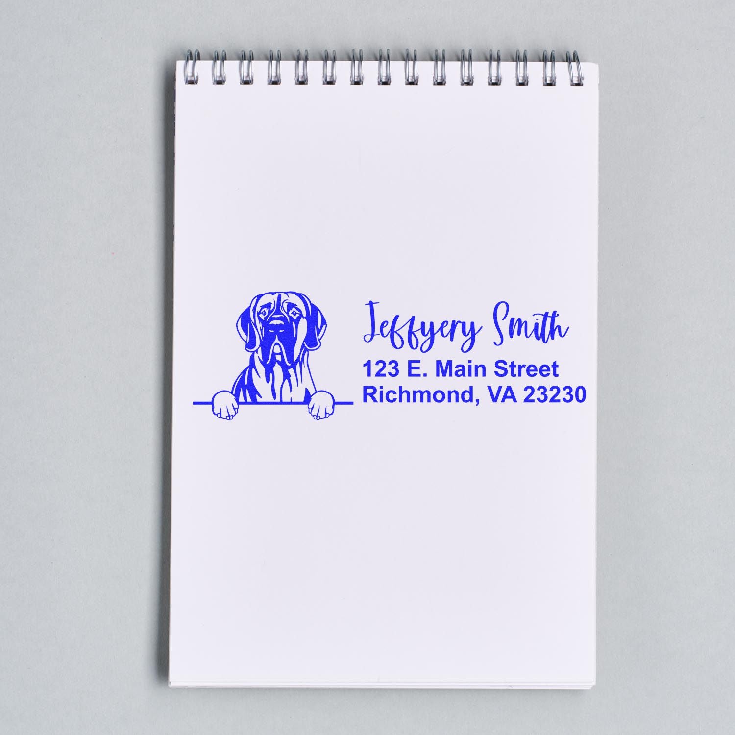 Custom dog return address rubber stamp with name and Richmond, VA address on a notebook page