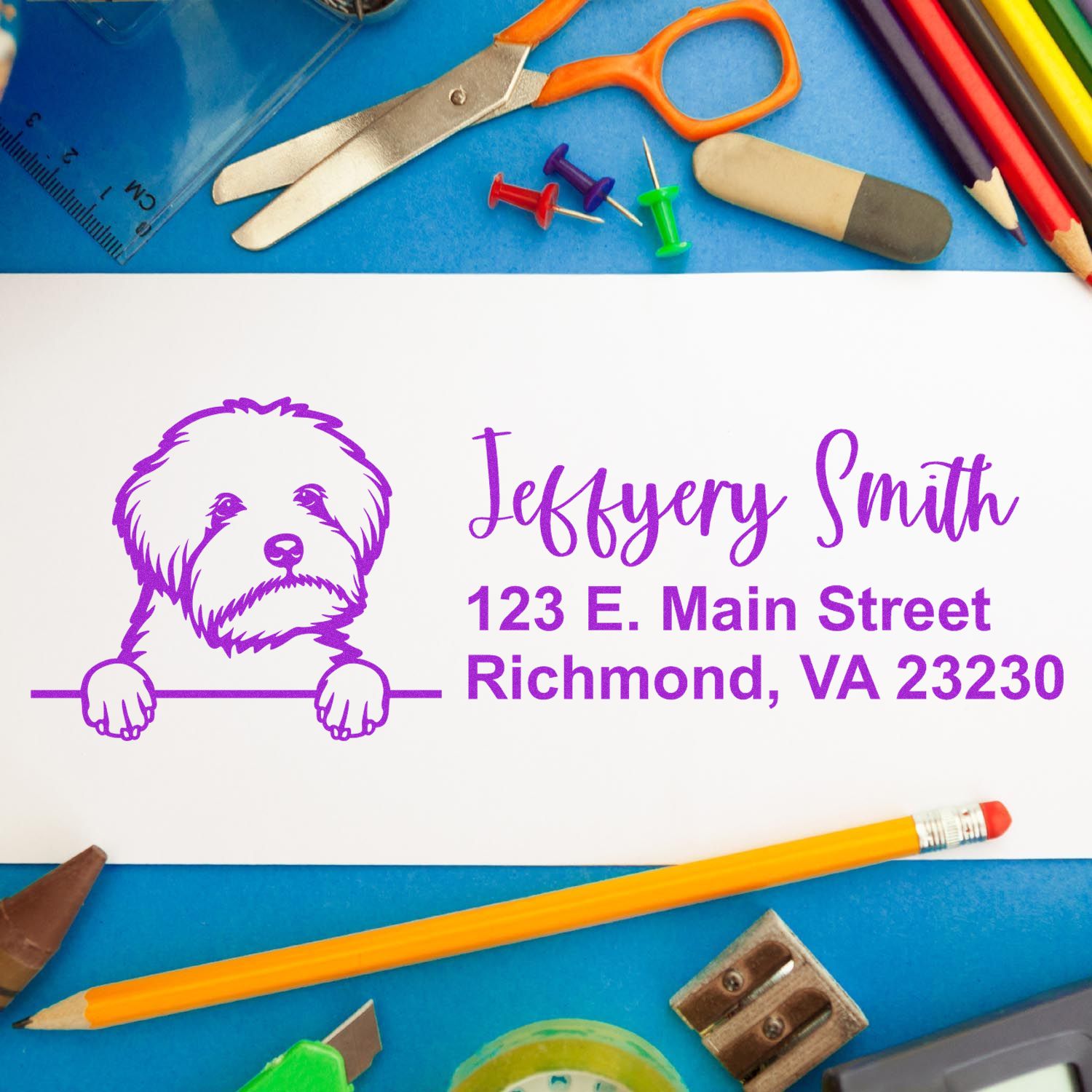 Custom rubber address stamp with dog logo, name, and Richmond, VA return address for personalized mailing.