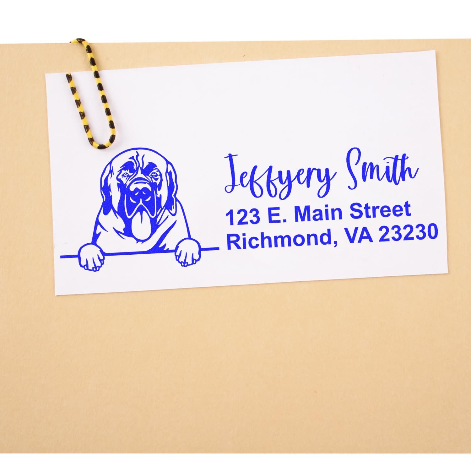 Personalized dog return address rubber stamp with name and Richmond, VA mailing details on an envelope