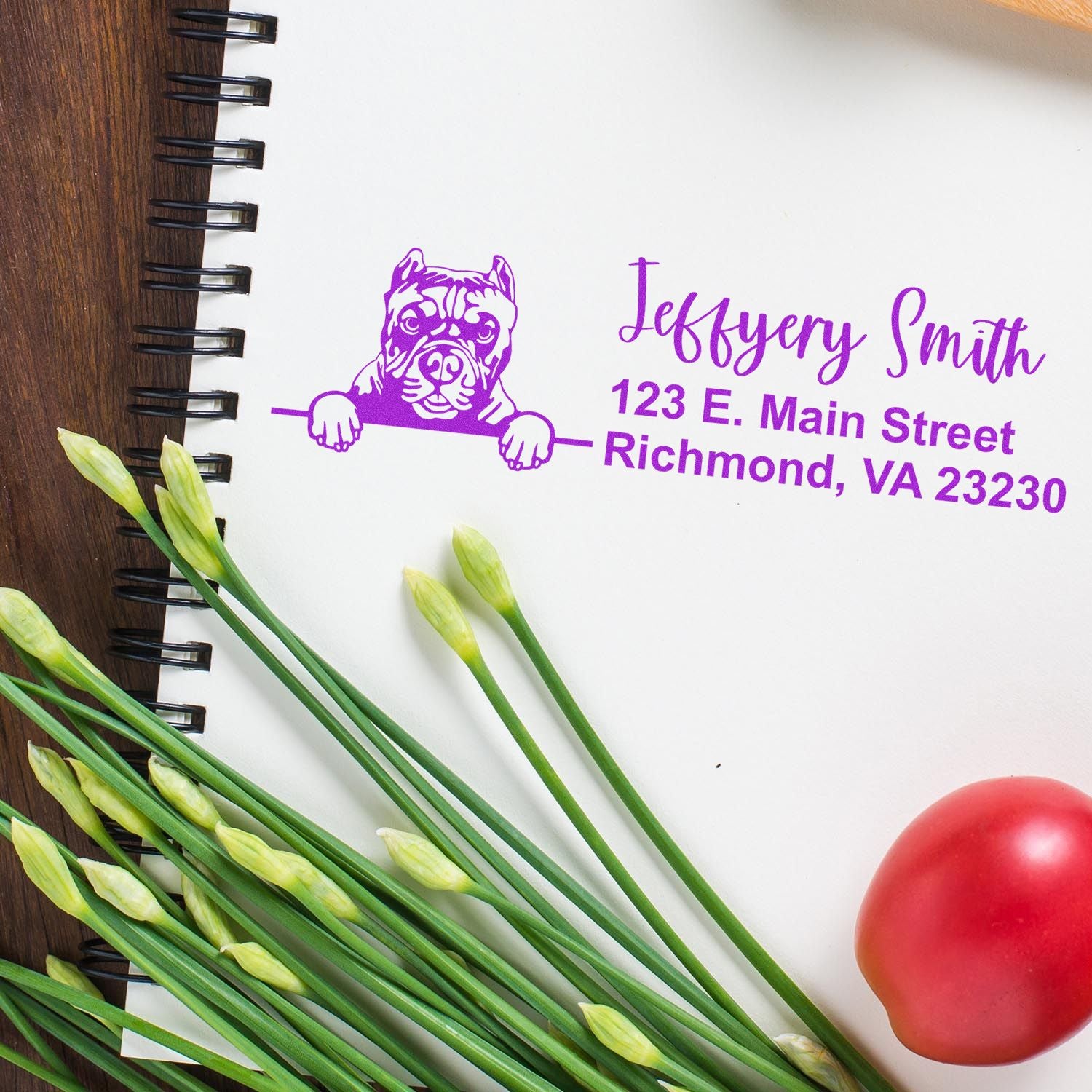Custom bulldog return address rubber stamp in purple ink on notebook, personalized with name and Richmond, VA address.
