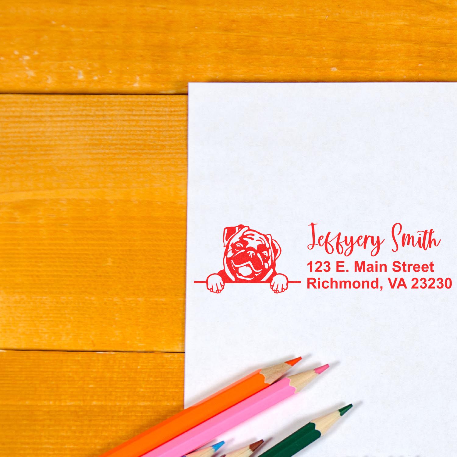 Custom address rubber stamp with dog logo for pet business branding and return mailings.