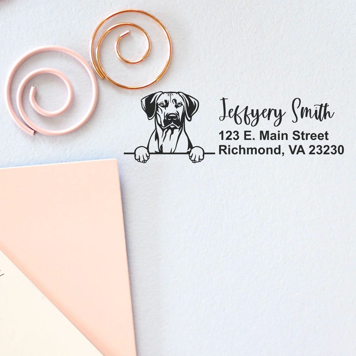 Personalized rubber address stamp with dog illustration for Jeffery Smith, featuring name and Richmond, VA return address.