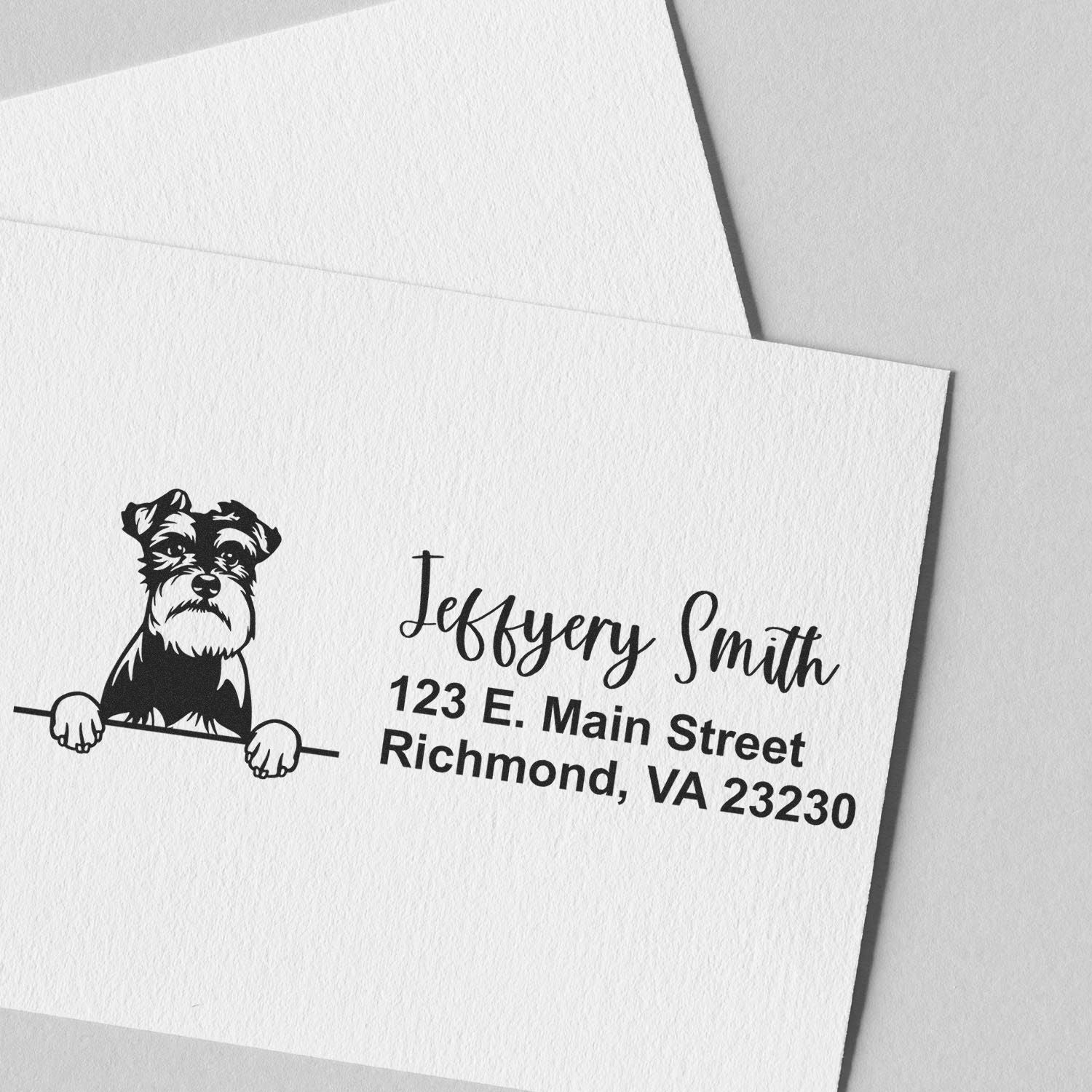 Custom rubber stamp with schnauzer illustration and return address for Jeffrey Smith, Richmond, VA 23230.