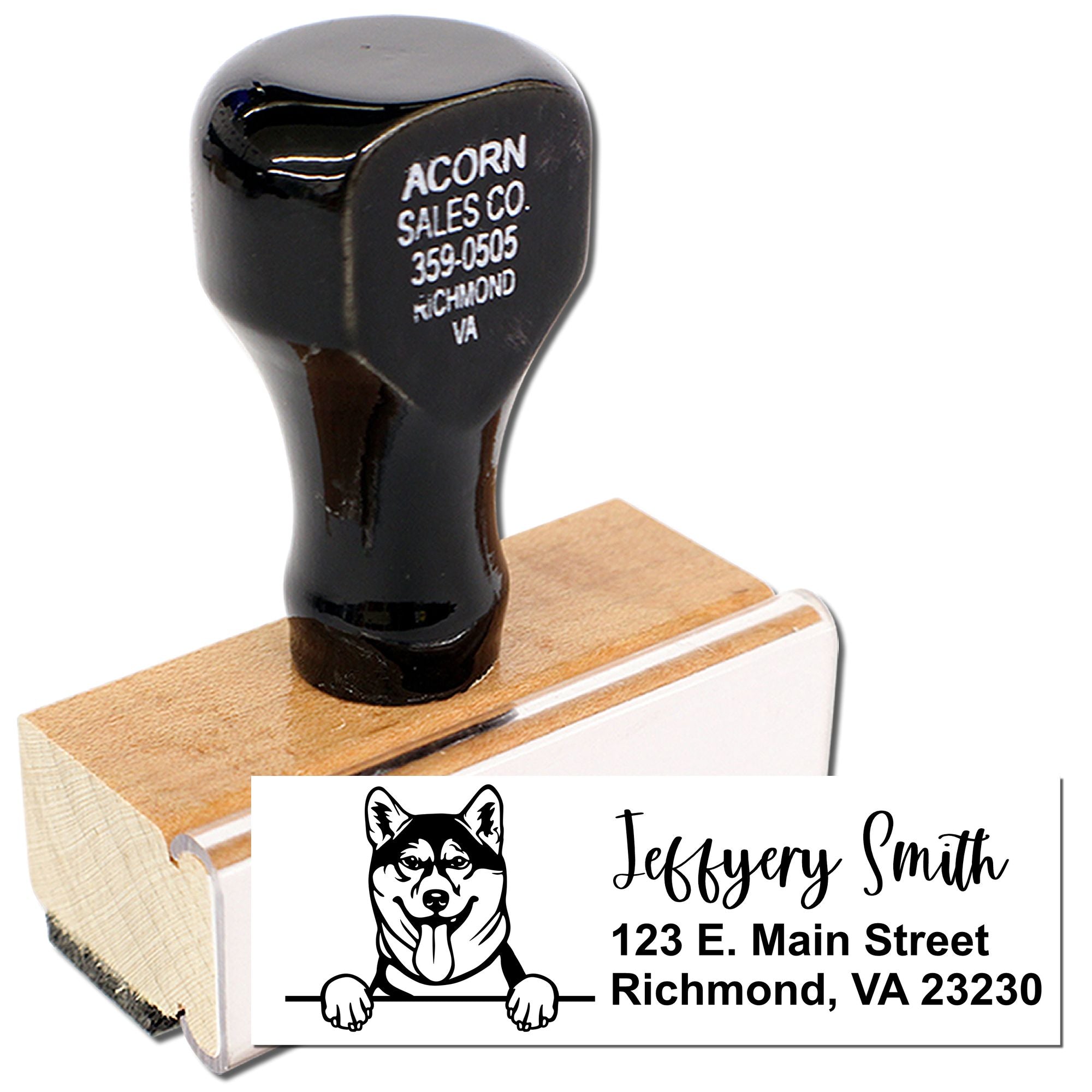 Custom rubber address stamp with dog logo and personalized return address for home or business mailing.
