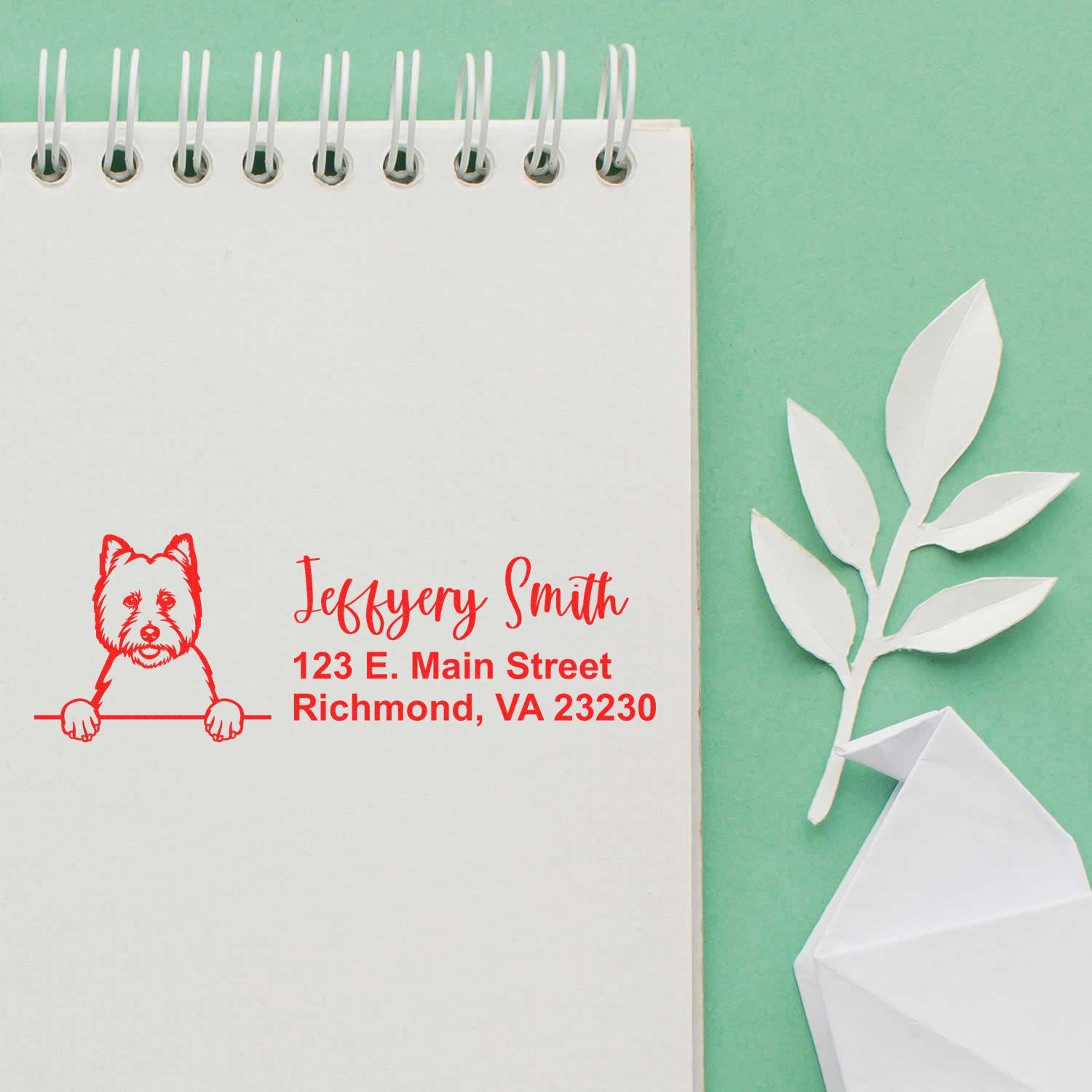Custom dog return address rubber stamp with name and Richmond, VA mailing address on notebook paper.