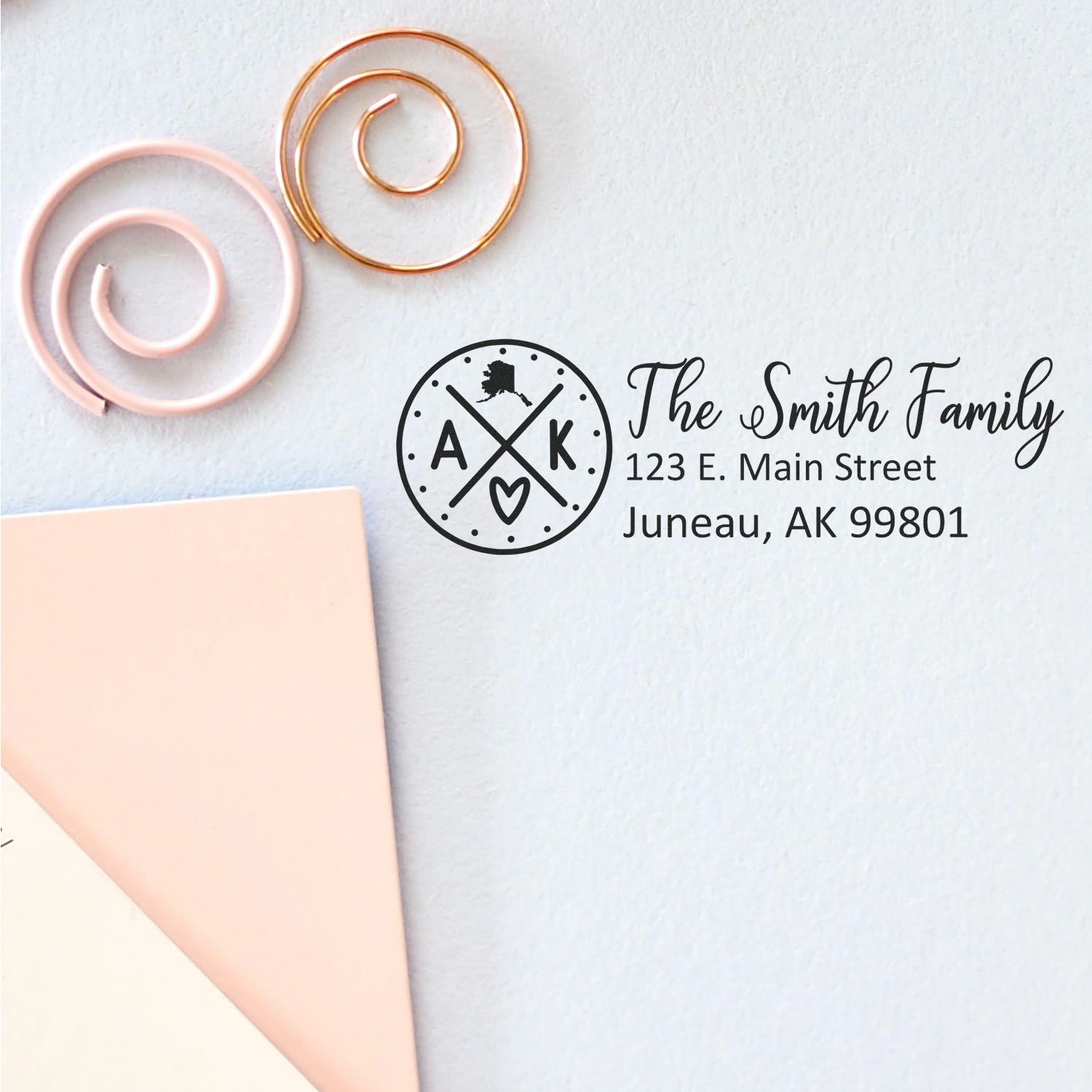 Custom family return address rubber stamp with Alaska monogram, The Smith Family, and Juneau, AK mailing address.