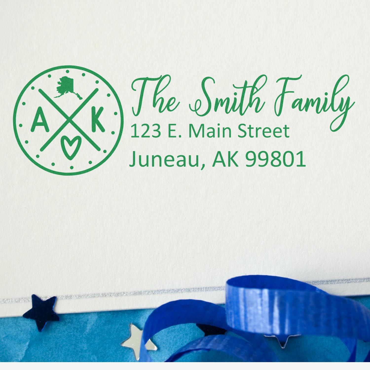 Custom return address rubber stamp for The Smith Family with Alaska monogram and Juneau, AK address.