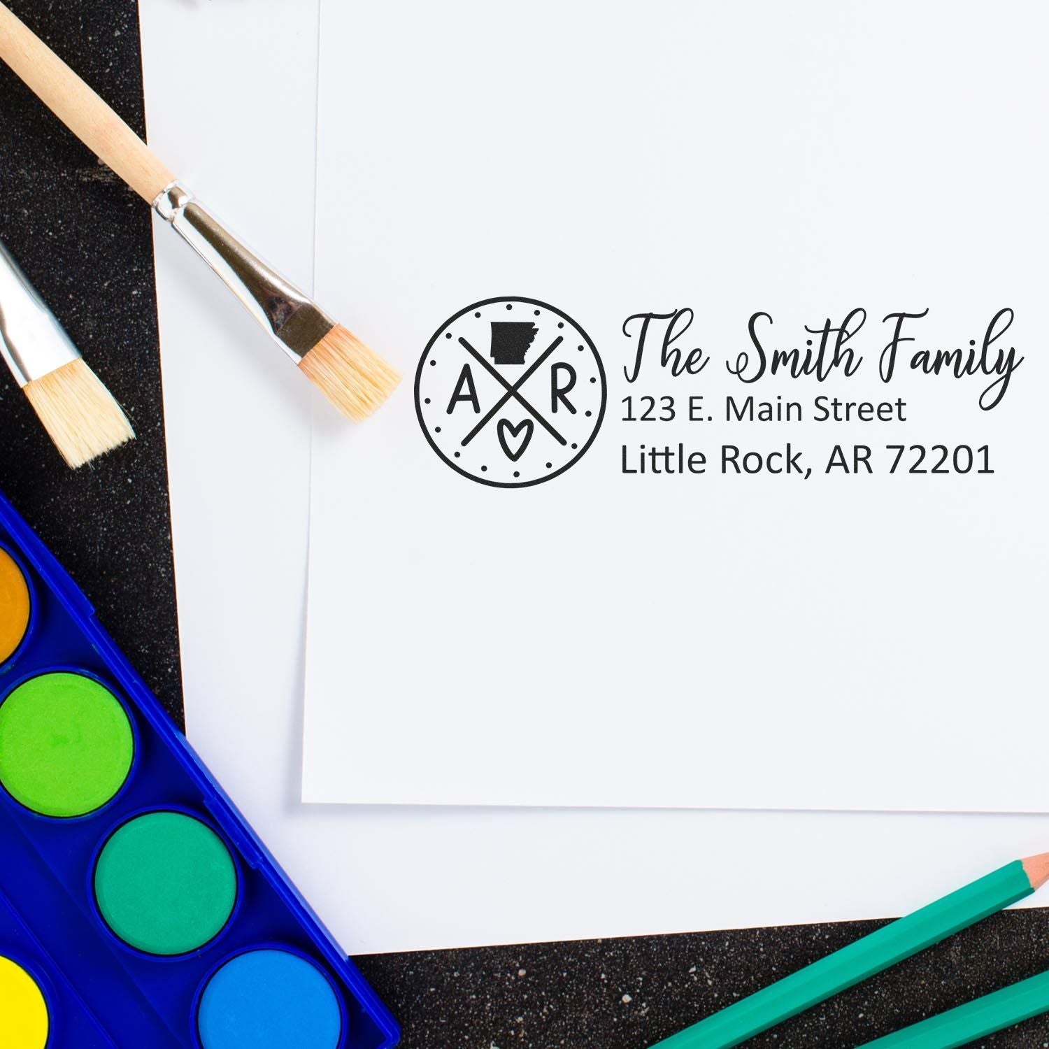 Custom rubber stamp return address design for The Smith Family, with Arkansas monogram on stationery and art supplies.