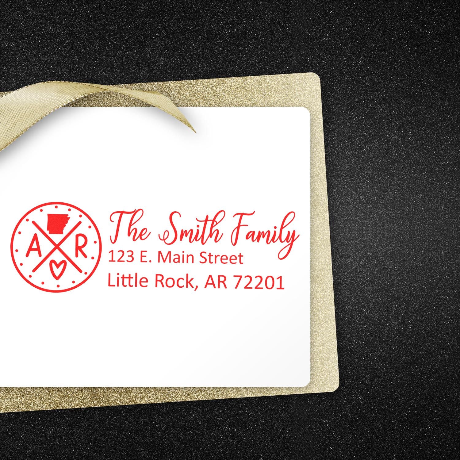 Custom return address rubber stamp for The Smith Family, Little Rock, AR 72201, with monogram design.