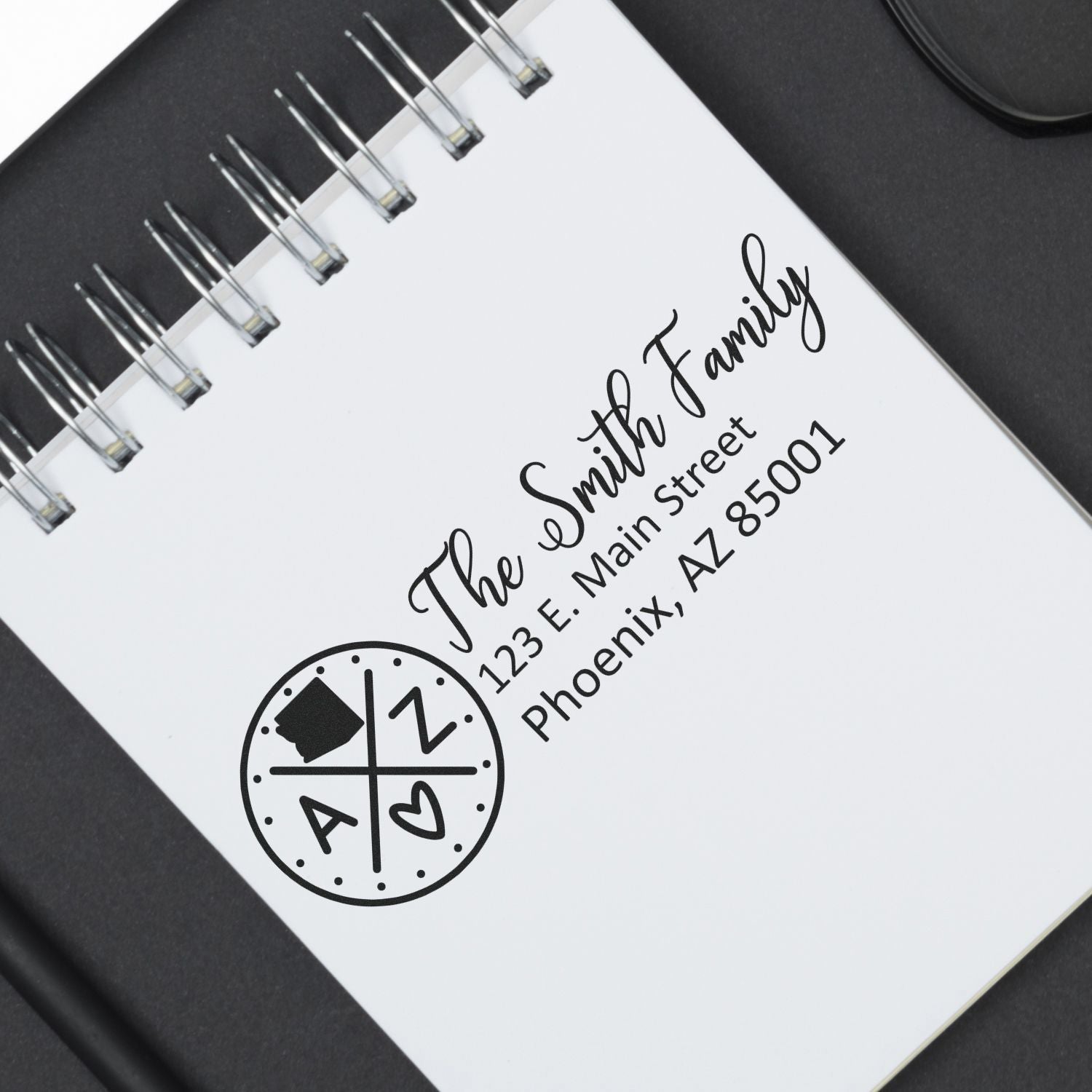 Custom family return address rubber stamp for The Smith Family, featuring name, address, and Phoenix, AZ.