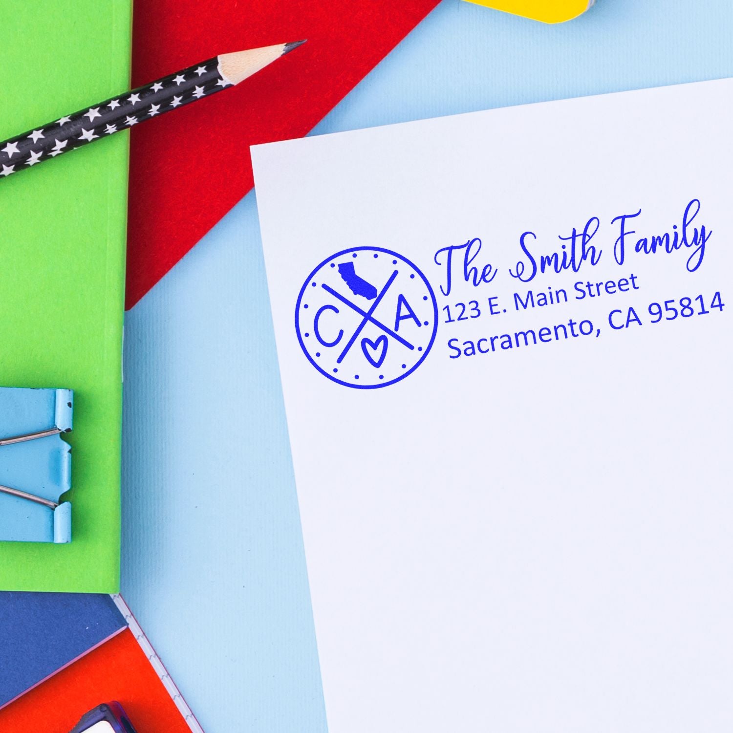 Personalized family return address rubber stamp with California monogram for The Smith Family, Sacramento, CA 95814.