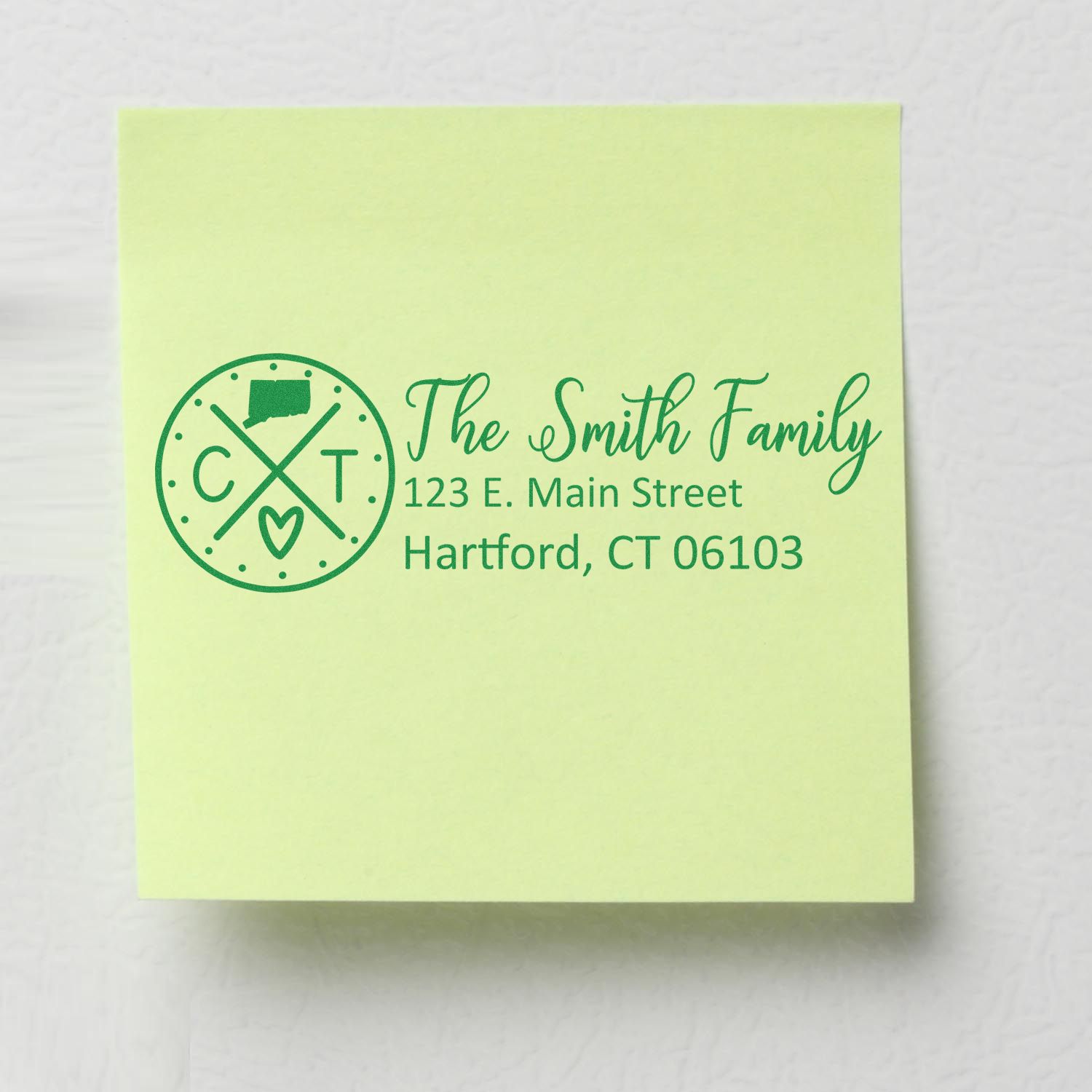 Custom family return address rubber stamp with monogram logo and Hartford, CT address for The Smith Family.
